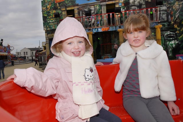 Emily Hamilton and Lara McCabe shared a ride during their visit to Cullens Easter Funfair at Ebrington Square. INLS1413-152KM
