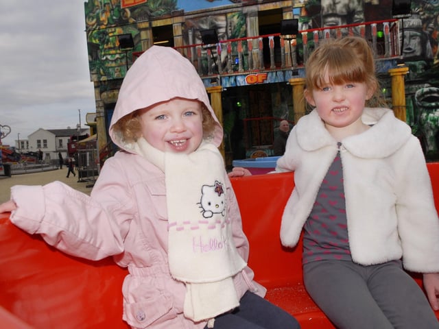 Emily Hamilton and Lara McCabe shared a ride during their visit to Cullens Easter Funfair at Ebrington Square. INLS1413-152KM