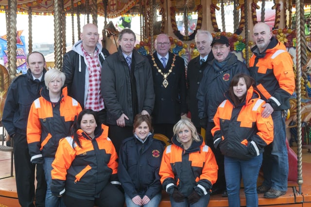 The Mayor, Kevin Campbell pictured at Cullen's Funfair which is being held in Ebrington Square from Friday 29th March until 7th April.   Cullen's Amusements will have collection boxes at the entrance of the funfair where donations can be made to Foyle Search and Rescue - the Mayor's chosen charity for this year. Included are Alderman Drew Thompson, Joe and Sean Cullen, Paul Doherty from ILEX, Sean Edwards and Ruari McAnaney from Foyle Search and Rescue with some of the volunteers. For more information on events being organised as part of the Mayor's Charity click on www.derrycity.gov.uk/mayor/mayorscharity. Picture Martin McKeown. Inpresspics.com. 29.3.1