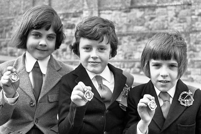 1975... Prizewinners in the boys' (8-10 years) double jig. On right is the winner, Colm Colhoun (McLaughlin School); in centre, Ciaran McGuigan (Kerrigan School, Omagh, who was second; and, on left, Liam Averill (McGuigan School, Maghera), who was third.