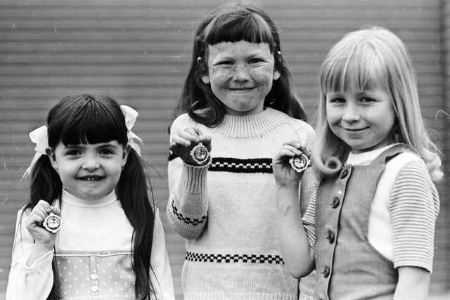 1976... Prizewinners in the verse-speaking competitions. From left are Barbara-Ann O'Donnell, St Anne's PS (winner of the under 7 contest), Sonia Friel, St Patrick's Girls' PS (first in the under 8 category) and Deirdre McCafferty, St Patrick's Girls' PS (runner-up in the same competition).