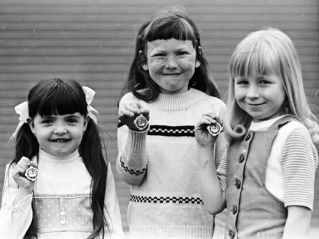1976... Prizewinners in the verse-speaking competitions. From left are Barbara-Ann O'Donnell, St Anne's PS (winner of the under 7 contest), Sonia Friel, St Patrick's Girls' PS (first in the under 8 category) and Deirdre McCafferty, St Patrick's Girls' PS (runner-up in the same competition).