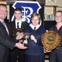 Mr. Aidan McKinney, Board of Governors, left, presenting the Northern Bank Cup for Mathematics to Michelle McGowan. Included are Martin Starrett (Single Science Award) and Tracey McCay (Double Science Award). (1/12/CD12)