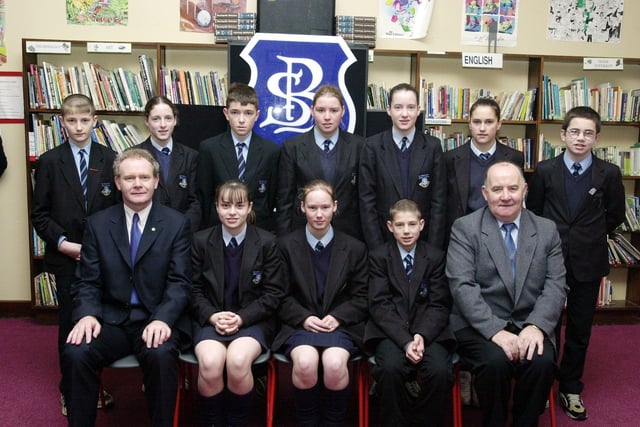 Martin McGuinness pictured with Year 10 prizewinners. Included, at front, are Natalie Quinn, Bernadette Holmes and Patrick Collins. Back, from left, are Damien Margowicz, Una Dunne, Damien Starrett, Claire O'Brien, Ciara Dunne, Ciara Doherty and Thomas Kelly. (1/12/CD15)