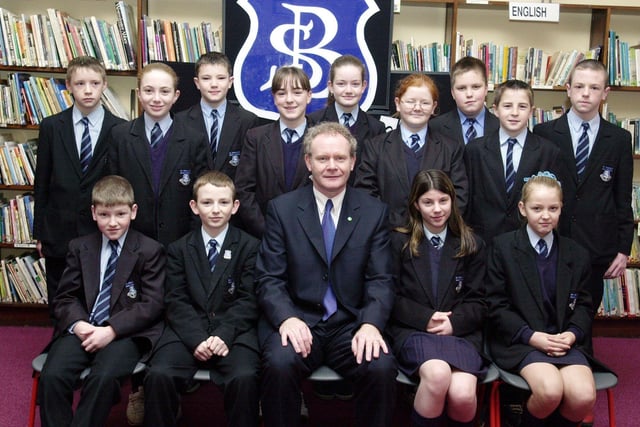 Martin McGuinness with Year 9 prizewinners. Front, from left, are Gavin Sweeney, Chris Harrison, Tara McGinley and Natalie McMonagle. Back, from left, are Aaron Sharkey, Laura Kyle, Kevin Gallagher, Louise Hutton, Deborah Callaghan, Caroline Harrigan, Stephen Crumley, Brian Smith and Kieran Harkin. (1/12/CD16)