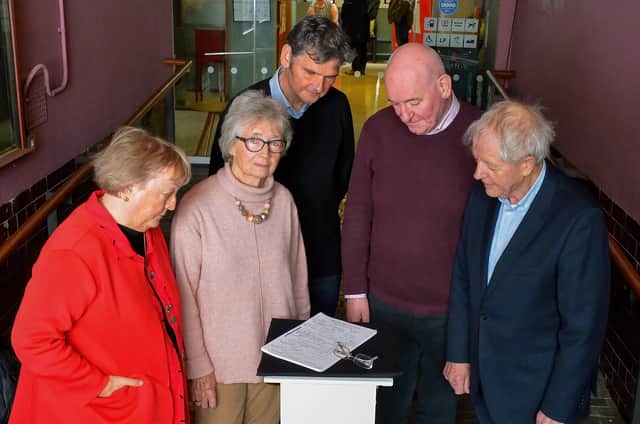Kevin Murphy, CEO of the Playhouse, centre, pictured at the launch of a new musical drama ‘Beyond Belief: The Life and Mission of John Hume’ at the venue on Monday afternoon with an original signed copy of the Good Friday Agreement  and signatories of the document  Monica McWilliams Emeritus Professor UU and co-founder of the NI Women’s Coalition, Brid Rodgers, leader of the SDLP team during the Good Friday Agreement talks, Mark Durkan, former SDLP leader, Deputy First Minister and MP and Professor Sean Farren, Chairperson of The John Hume Foundation. Photo: George Sweeney. DER2215GS – 014
