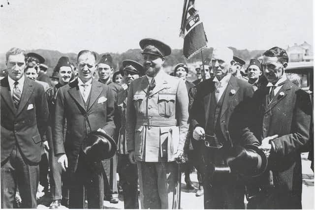 General Italo Balbo with members of Derry's Italian community at Harbour Square during the visit of the massed flight of seaplanes from Rome en route to Chicago in July 1933. During the war, he was Govenor of Libya and, when he was coming in to land at his own airfield, Italian gunners shot down his plane. (Bigger & McDonald Collection).