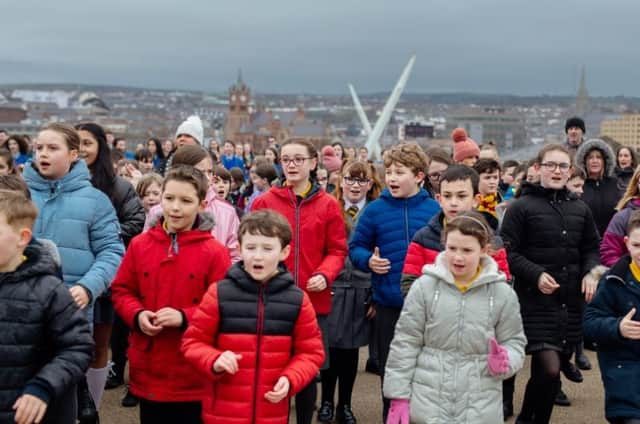 Local school children filming a music video that will be featured in Walled City Passion this Easter.