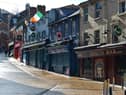 Bars on Waterloo Street closed and the street deserted on Wednesday afternoon last. DER1220GS - 012