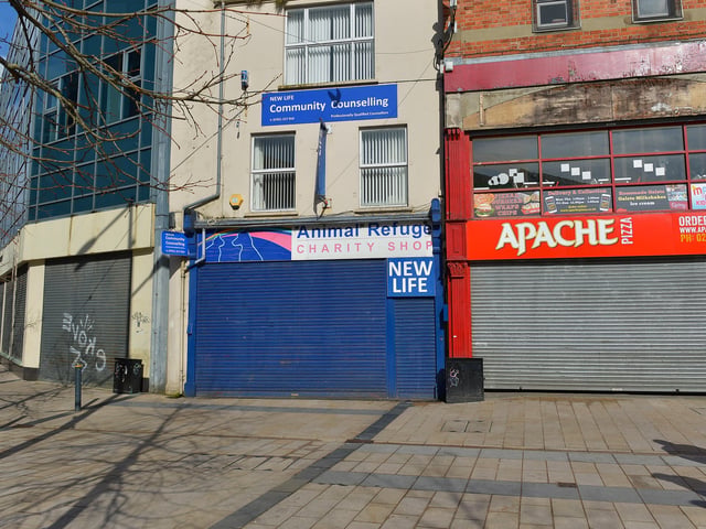 Business premises closed on Strand Road. DER1220GS - 026