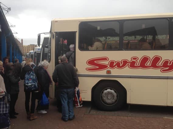 Lough Swilly bus leaving Derry station.