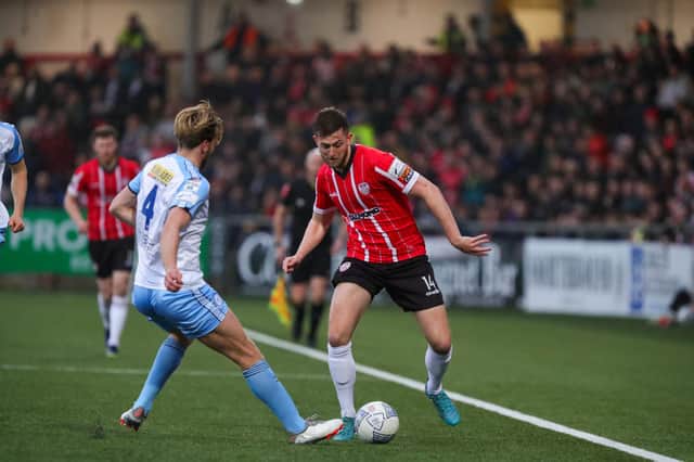 Will Patching pictured in action against Shelbourne at a packed Brandywell on Friday night. Photograph by Kevin Moore.