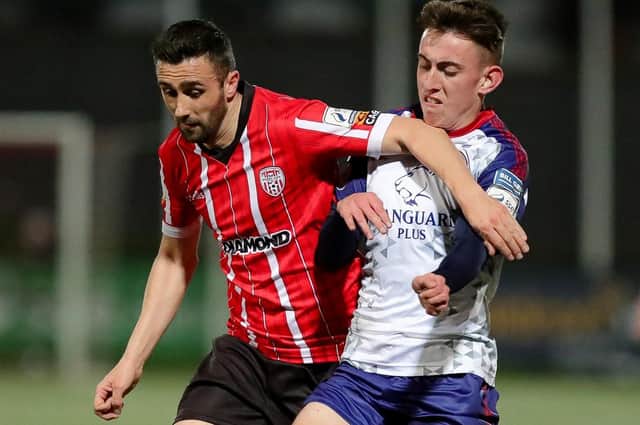 Derry City's Danny Lafferty tussles with St Patrick's Athletic winger Darragh Burns. Picture by Kevin Moore/MCI