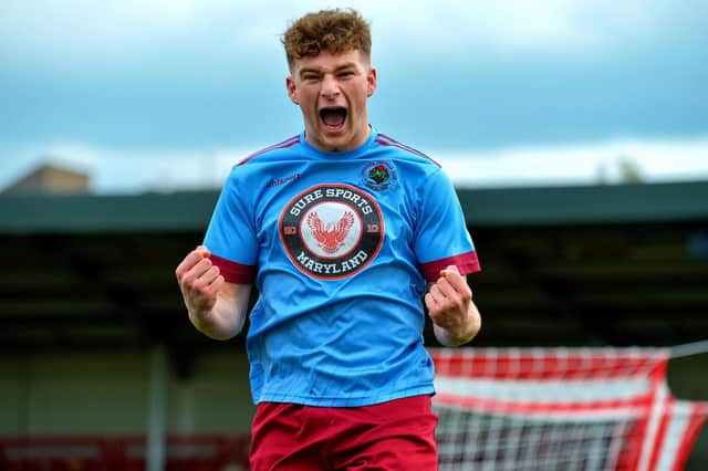 Mark McFadden celebrates scoring Institute's first goal in their 3-2 win over Queen's University Belfast in the Brandywell. Picture by George Sweeney.