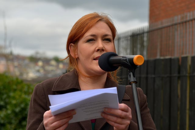 Julieann Campbell reads a poem she wrote for the occasion at a commemoration in Fahan Street, on Saturday afternoon last, marking the 40th anniversary of the death of 11-year-old Stephen McConomy who was killed by a plastic bullet. Photo: George Sweeney. DER2215GS – 076