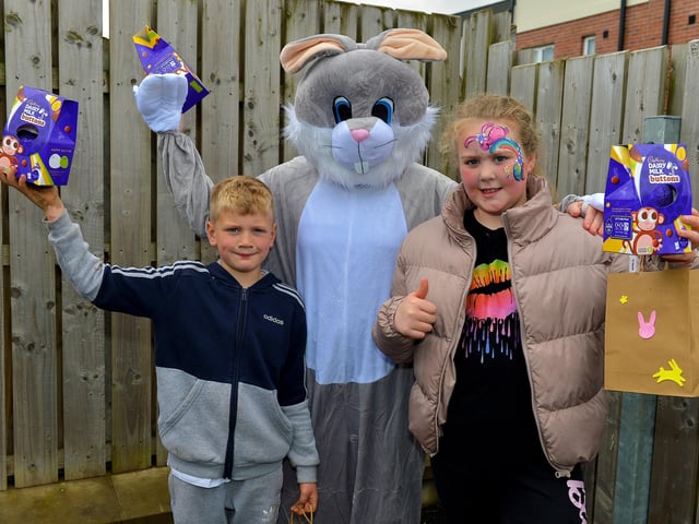Corey and Clodagh pictured with the Easter Bunny at the Glenabbey Easter Party held in the Radius Housing Hub on Thursday afternoon last. DER2215GS – 032