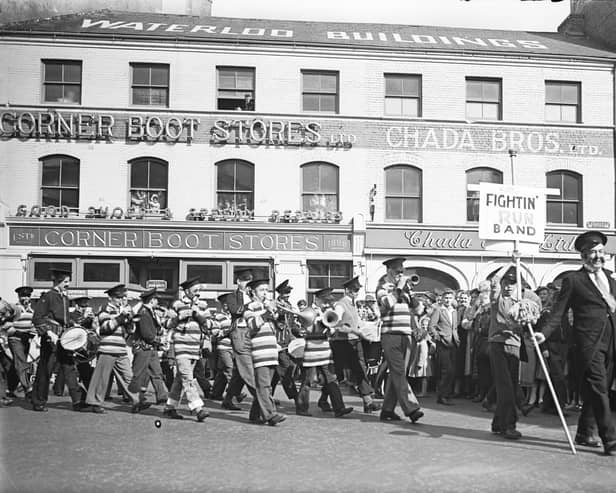 1950s... The Long Tower Carnival passes the Corner Boot Stores at Waterloo Street which was owned by the Chada family.