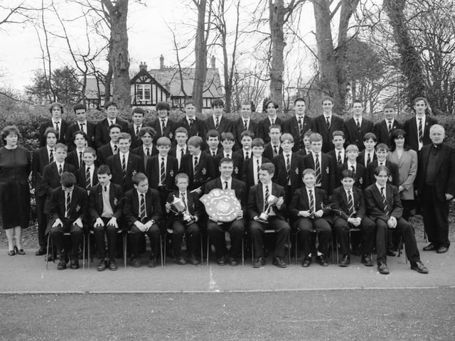St. Columb’s College orchestra, winners of the Post-Primary School Orchestra at Feis Doire Colmcille. The school also won the Bishop’s Shield for the school with the most marks at the Feis. Included are, standing left, Sr. Perpetua and, standing right, Margaret Ross, and Fr. John Walsh, school president.