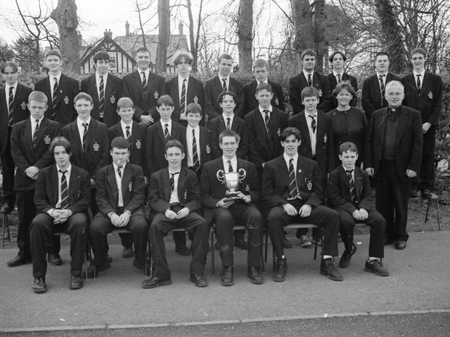 St. Columb’s College senior choir, winners of the Sacred Music Post-Primary and Youth Choir Under-19 at Feis Doire Colmcille. Included are music teacher Sr. Perpetua and Fr. John Walsh, school president.