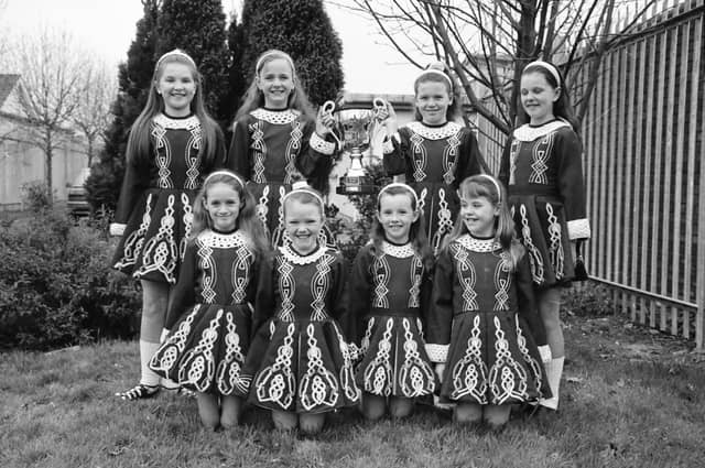 Members of the McConomy School who won the Brendan DeGlin Cup for Figure Dance 8-12 years at the 1997 Feis. Front, from left, Shauna McDevitt, Elan Bradley, Ciara McConomy and Laura Jayne Brady. Back, from left, Joanne Kavanagh, Frances McGonagle, Emma Jayne Ryan and Leanne McConomy.