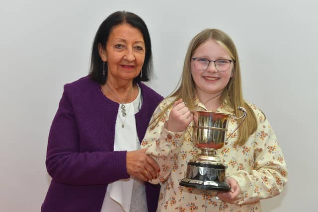 Stella McMonagle, First in English Song 10 -12 years old, pictured with Ray McGinley, McGinley School of Music and Drama, at the recent Féis Dhoíre Cholmcílle, held in Millennium Forum . DER2216GS 020