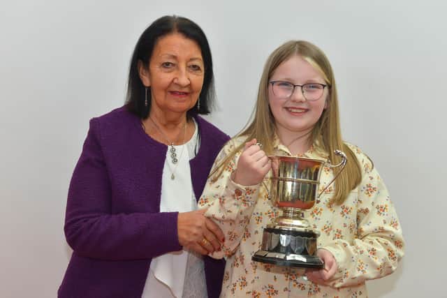 Stella McMonagle, First in English Song 10 -12 years old, pictured with Ray McGinley, McGinley School of Music and Drama,  at the recent Féis Dhoíre Cholmcílle, held in Millennium Forum . DER2216GS  020