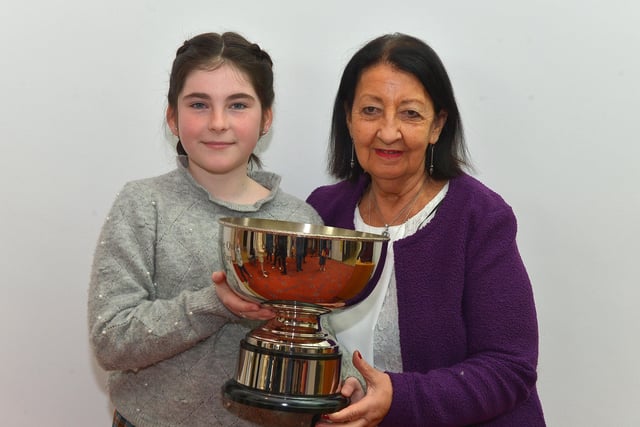 Aimee Rose Carey, winner of the Eithne Quigley Rose Cup, pictured with Ray McGinley, McGinley School of Music and Drama,  at the recent Féis Dhoíre Cholmcílle, held in Millennium Forum . DER2216GS  019