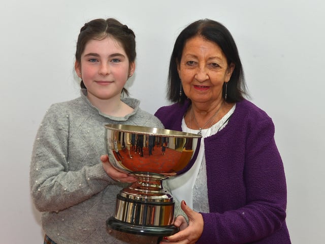Aimee Rose Carey, winner of the Eithne Quigley Rose Cup, pictured with Ray McGinley, McGinley School of Music and Drama, at the recent Féis Dhoíre Cholmcílle, held in Millennium Forum . DER2216GS 019
