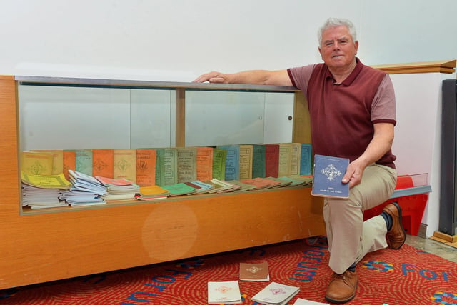 Féis Secretary, Pat McCafferty, pictured with display of Féis Books dating from 1922 t0 2022 at at the recent Féis Dhoíre Cholmcílle, held in Millennium Forum. Photo: George Sweeney DER2216GS  022
