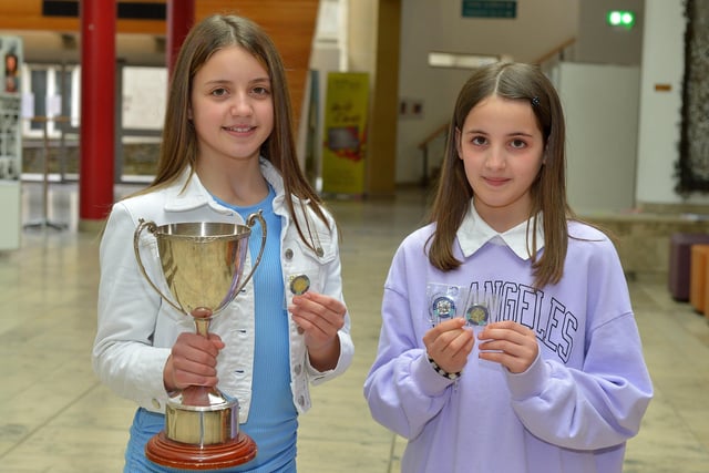 Thornhill pupil Crystal Gjorgjievski, achieved First place in Irish Song 10  12 years, while her sister Heidi, a pupil at St Annes PS achieved second place in both English and Irish Song 10  12 years at the recent Féis Dhoíre Cholmcílle, held in Millennium Forum. Photos: George Sweeney DER2216GS  026