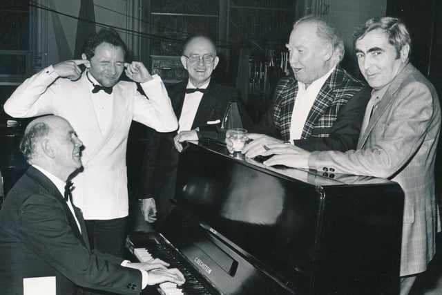 The late James MacCafferty with friends, including Phil Coulter and Joseph Locke.