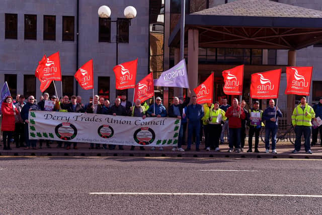 Council employees and trade unionists picket Derry City Council Offices on Strand Road recently as part of industrial action take over better pay demand. Photo: George Sweeney.  DER2212GS – 012