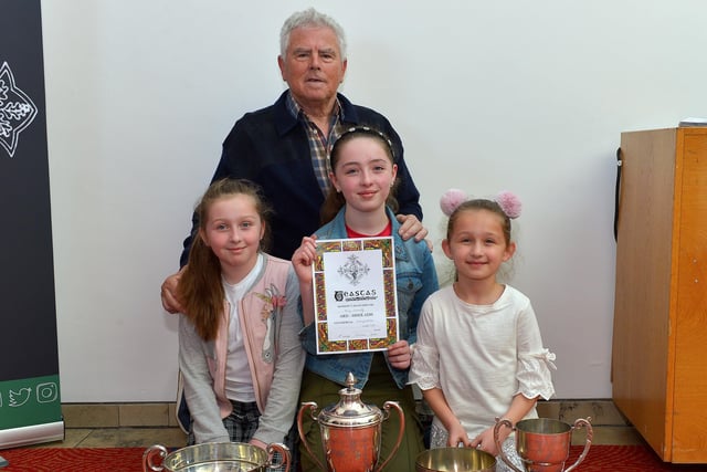 Féis Secretary Pat McCafferty pictured with Eva Connolly winner of the George White Cup, May Connolly winner of the Jim Chapman Cup and Elowen Connolly winner of the Kathleen Henderson Cup and bursary at the Féis Dhoíre Cholmcílle, held in Millennium Forum. DER2216GS  119