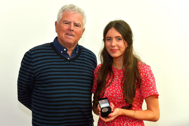 Ella McLaughlin, winner of the James McCafferty Medal, pictured with Féis Secretary Pat McCafferty   at the Féis Dhoíre Cholmcílle, held in Millennium Forum. DER2216GS  039
