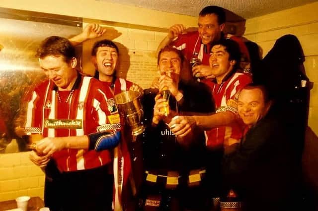 Derry City’s Liam Coyle, Declan Boyle, Declan Devine, Paul Curran, Peter Hutton and John Pio O’Doherty (fan) celebrate the 1997 title triumph.