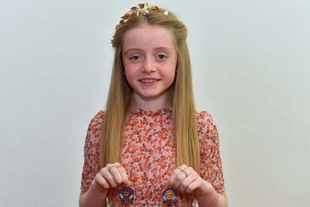 Brooke Porter achieved first place P6 Studied Prose and third place P6 Girls Verse at the Féis Dhoíre Cholmcílle, held in Millennium Forum. DER2216GS  113