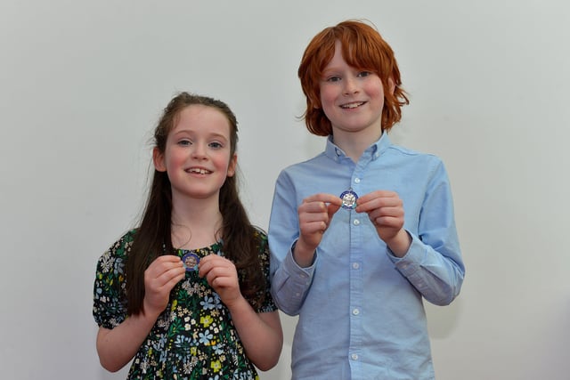 Radha Morrin achieved second place P3 Prose and her brother Fiann achieved second place P5 Boys Verse  at the Féis Dhoíre Cholmcílle, held in Millennium Forum. DER2216GS  096