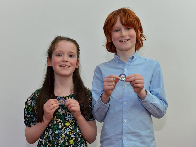 Radha Morrin achieved second place P3 Prose and her brother Fiann achieved second place P5 Boys Verse at the Feis Doire Colmcille, held in Millennium Forum. DER2216GS 096