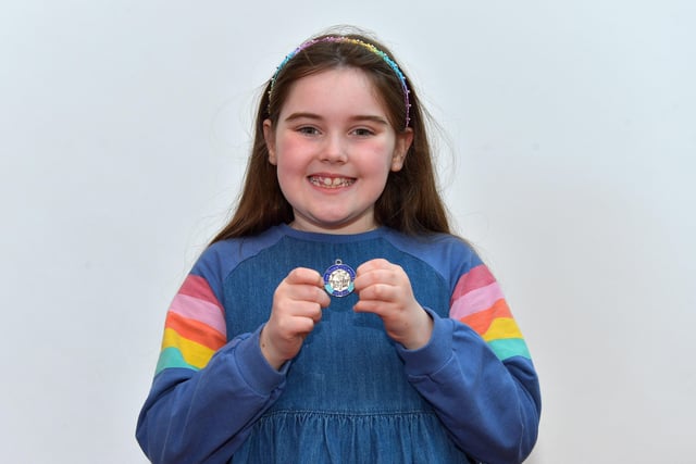 Clodagh Robson was placed second in P4 Girls Verse at the Féis Dhoíre Cholmcílle, held in Millennium Forum. DER2216GS  098