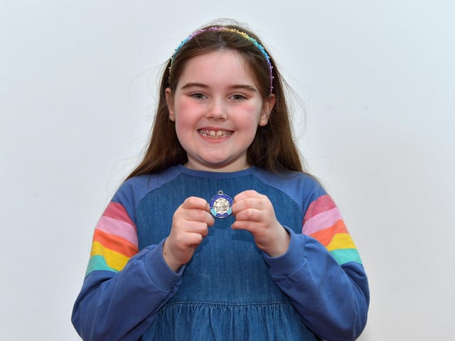 Clodagh Robson was placed second in P4 Girls Verse at the Feis DoIre ColmcIlle, held in Millennium Forum. DER2216GS 098