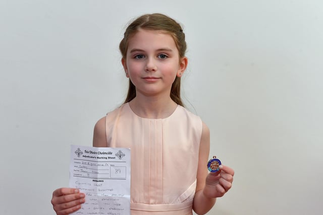 Angel McMonagle achieved second place P4 Girls Verse at the Feis Doire Colmcille, held in Millennium Forum. DER2216GS  105