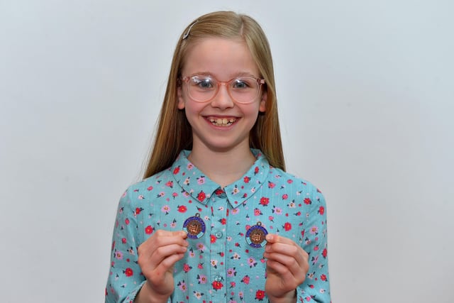 Charlotte Doran achieved Third place English song age 10 to 12 and Third place P7 Studied Prose at the Féis Dhoíre Cholmcílle, held in Millennium Forum. DER2216GS  099