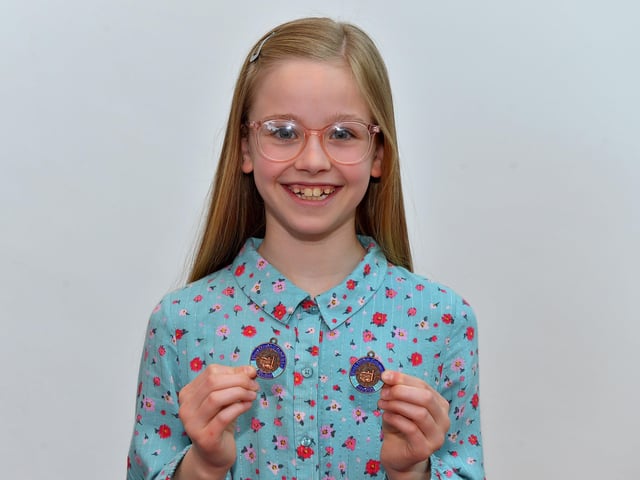 Charlotte Doran achieved Third place English song age 10 to 12 and Third place P7 Studied Prose at the Feis Doire Colmcille, held in Millennium Forum. DER2216GS 099