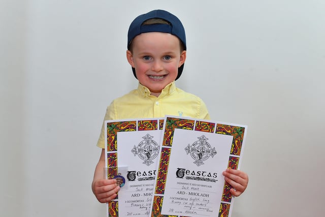 Jack Moore was placed third in Childrens Poem a d highly commended in both Childrens Irish Song and Childrens English Song at the Féis Dhoíre Cholmcílle, held in Millennium Forum. DER2216GS  138