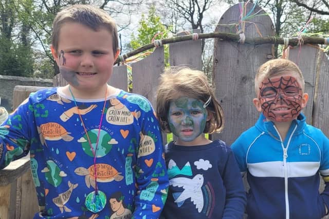 William, Emily and Tyler having fun at the North West Eco Fest in St Columb's Park Walled Garden.