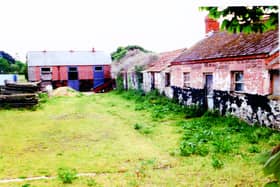 The Alexanders home (on right) at the Lusk prison site.