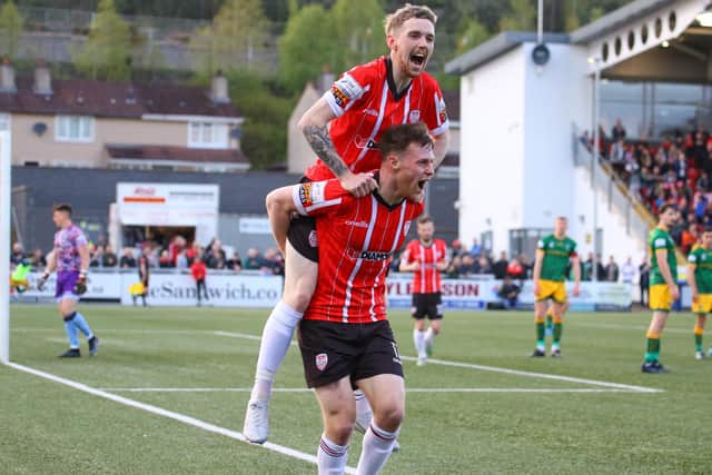 Derry City's Jamie McGonigle jumps on Cameron McJannet's back after the defender scored the Brandywell men's fourth goal. Picture by Kevin Moore/MCI
