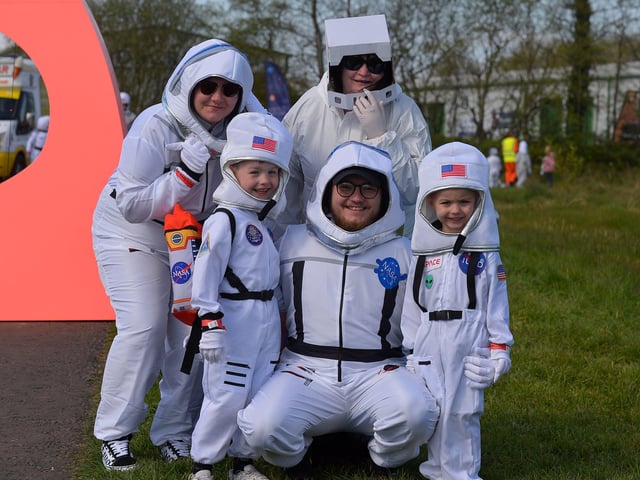 Families arrive at Bay Road Park, on Saturday morning, to take part in a successful world record attempt for the most people dressed as astronauts in one place. Photo: George Sweeney. DER2216GS – 191