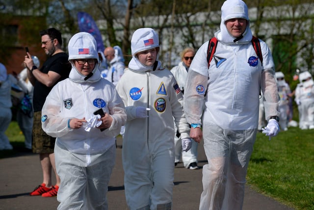 People arrive at Bay Road Park, on Saturday morning, to take part in a successful world record attempt for the most people dressed as astronauts in one place. Photo: George Sweeney. DER2216GS – 195