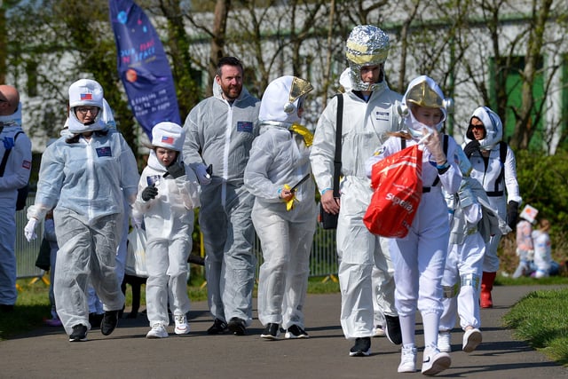 Would be record breakers arrive at Bay Road Park, on Saturday morning, for the successful world record attempt for the most people dressed as astronauts in one place. Photo: George Sweeney. DER2216GS – 198